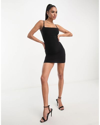 Fashionkilla Vestito corto fasciante nero dal design sinuoso con spalline sottili, scollo squadrato e schiena scollata