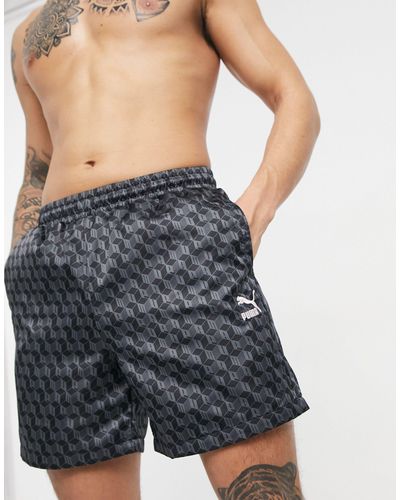 PUMA – summer luxe – satin-shorts mit durchgehendem print - Schwarz