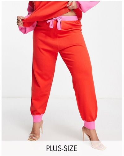 Never Fully Dressed Pantalon d'ensemble en maille contrastante - rose/ - Rouge
