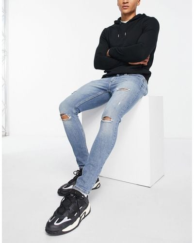 River Island Spray On Ripped Jeans - Blue