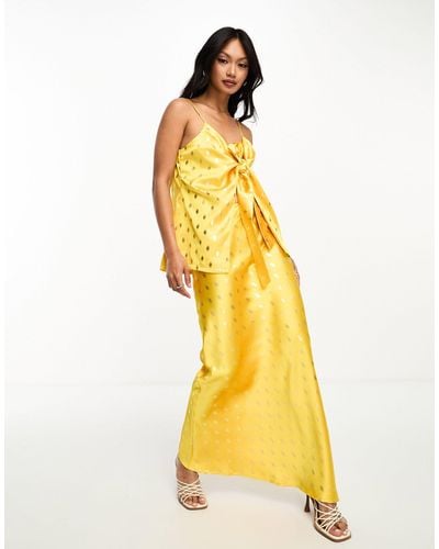 Never Fully Dressed Falda larga amarillo dorado con lazada sunshine