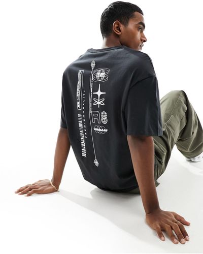 Jack & Jones T-shirt oversize avec imprimé urbain au dos - Noir