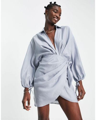 ASOS Drape Wrap Front Mini Dress With Oversize Blouson Sleeve And Open Back Detail - Blue