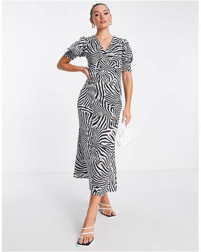 Never Fully Dressed – maxikleid mit puffärmeln und zebramuster - Weiß