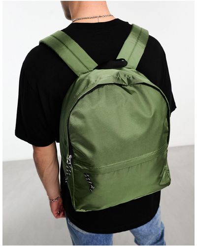 ASOS – rucksack aus khakifarbenem ripstop mit farblich abgesetztem reißverschlusszieher - Grün