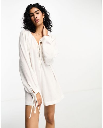 Luna – pyjama-overall mit raglanärmeln aus baumwolle - Weiß
