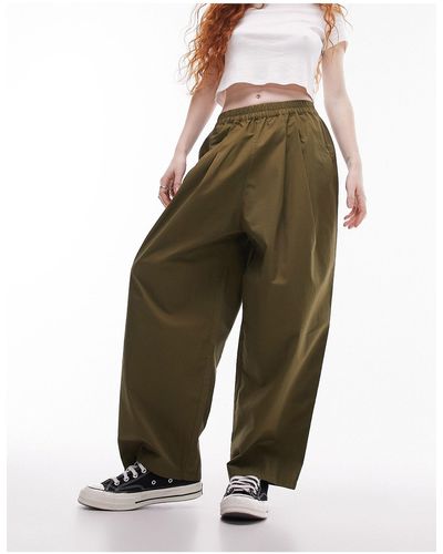 TOPSHOP Pantalones s plisados - Verde