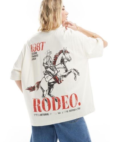 ASOS T-shirt coupe boyfriend avec imprimé rodeo - crème - Gris