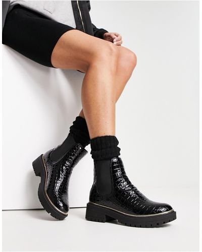 Truffle Collection Bottines chelsea avec bordure dorée - croco - Noir