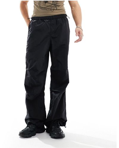 ASOS Pantalones s holgados con bajo ancho - Negro