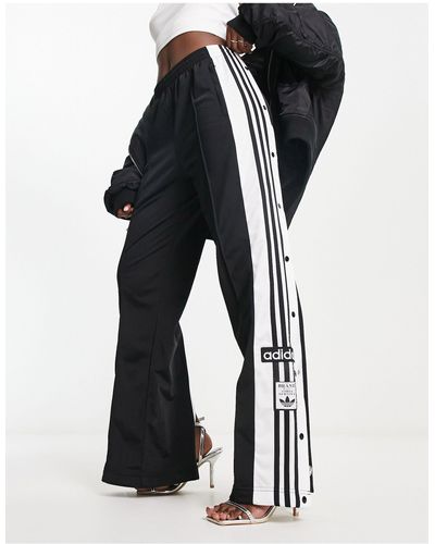 Pantaloni casual, eleganti e chino Nero adidas Originals da donna | Lyst