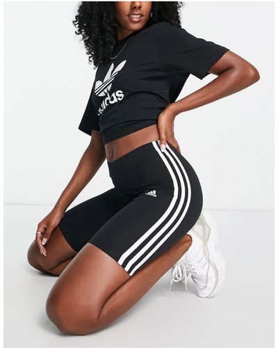 adidas Originals Adidas - sportswear essential - pantaloncini leggings neri con 3 strisce - Nero