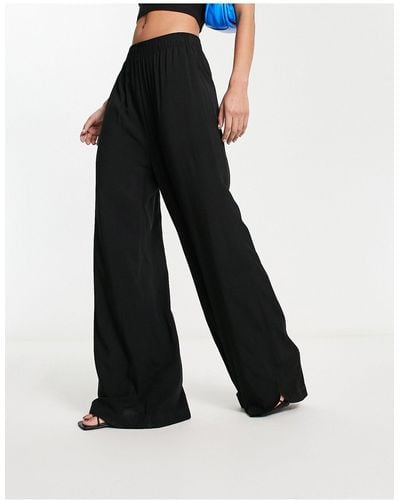 Urban Classics Pantalon large stretch - noir