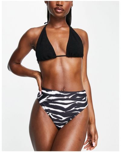 Missguided Exclusive Super High Leg Thong Swimsuit in Black