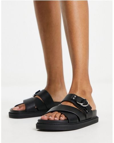 Schuh Tamara - sandali bassi neri con fascette incrociate - Nero