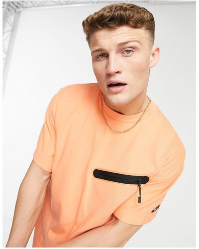 Nike – tech – t-shirt aus sweatshirt-stoff - Orange