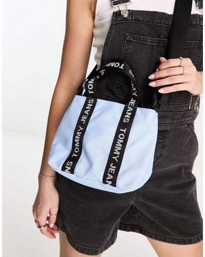 Tommy Hilfiger Bags | Tommy Hilfiger Camera Crossbody Bag in Dark Navy PVC Letters Monogram Jacquard | Color: Blue/White | Size: 8 x 5.5 x 3 