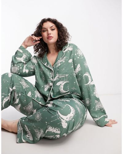 ASOS DESIGN satin shirt & pants pajama set with contrast piping in emerald  green
