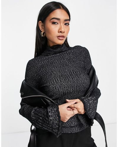 ASOS Jersey negro y blanco con cuello alto y diseño