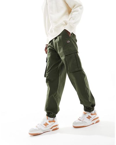 Champion Pantalones cargo caqui con bajos ajustados rochester - Verde