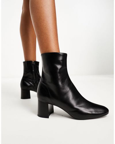 Mango – ankle-boots aus em kunstleder mit runder zehenpartie - Schwarz