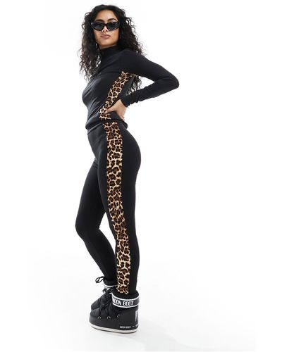 Threadbare Completo da sci con top base layer e leggings neri con stampa leopardata a contrasto - Nero