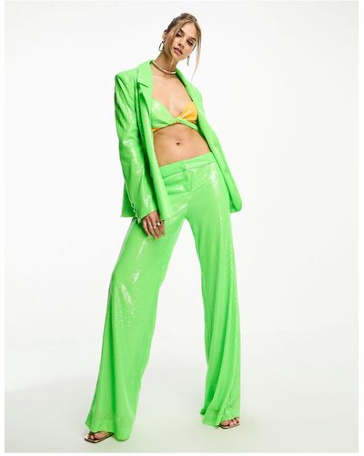 Annorlunda Pantaloni da abito larghi acceso con paillettes - Verde