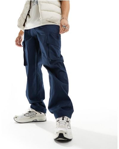 ASOS Pantalon cargo baggy en tissu ripstop avec taille élastique - Bleu