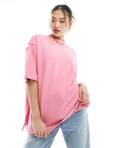 The Couture Club T-shirt slavato con stemma - Rosa