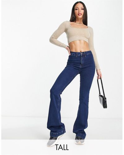 River Island Jeans a zampa a vita medio alta medio senza tasche - Blu