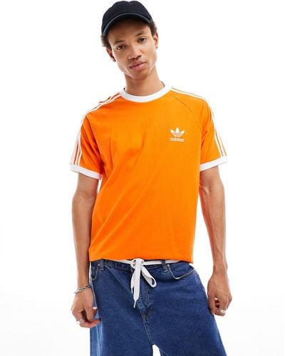 adidas Originals – t-shirt mit drei streifen - Orange