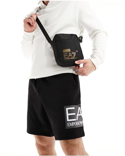 EA7 Bolso reportero pequeño negro y dorado con logo core - Blanco