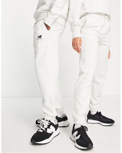 New Balance Joggers unisex grigi con logo - Bianco
