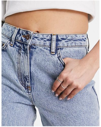 Collusion X008 - Ruimvallende Flared Jeans Met Wassing - Blauw