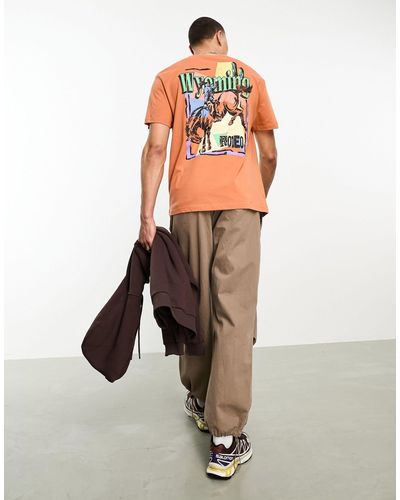 ASOS T-shirt comoda color argilla slavato con stampa di cowboy sul retro - Arancione