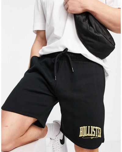 Hollister Pantaloncini della tuta neri con logo stile college - Nero