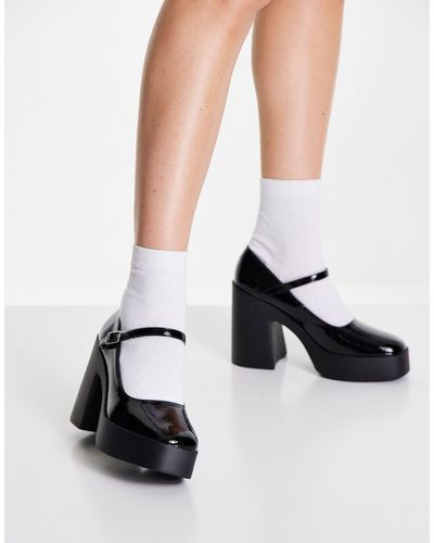 ASOS Penny - chaussures babies à semelle plateforme à talon - Noir