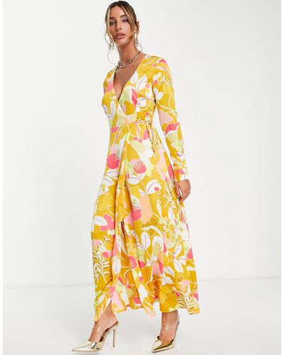 Liquorish Robe cache-cœur mi-longue à motif fleuri style années 70 - Multicolore