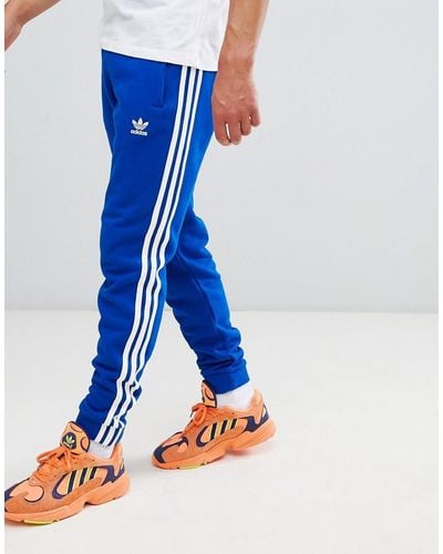 adidas Originals Adicolor 3-stripe Sweatpants In Blue Cw2430