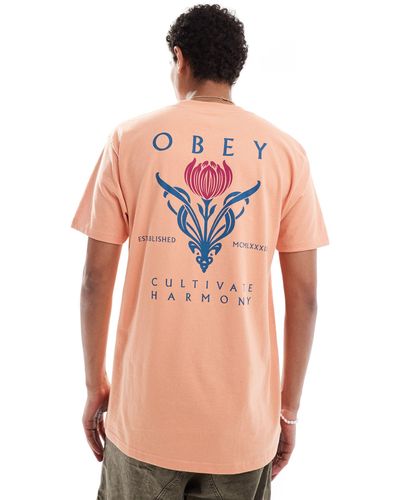 Obey T-shirt con grafica "cultivate harmony" - Rosa
