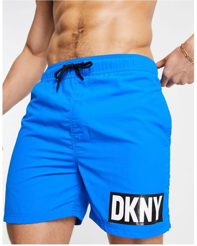 DKNY Pantaloncini da bagno medio e neri con logo - Blu