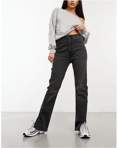 WÅVEN Ida - jeans a vita alta con spacco sul fondo lavaggio scuro sporco - Nero