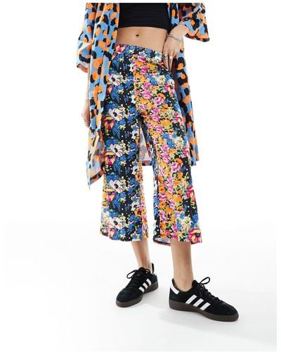 ASOS Pantalones sin cierres con estampado floral - Multicolor