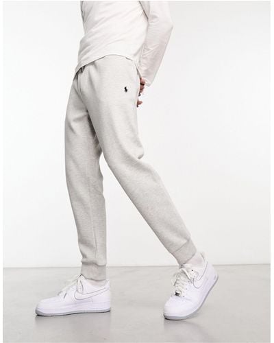 Polo Ralph Lauren – jogginghose aus kalkem doppelstrick mit markenlogo und bündchen - Weiß