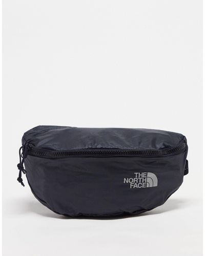 The North Face Flyweight Lumbar - Ripstop Crossbody Tas - Blauw