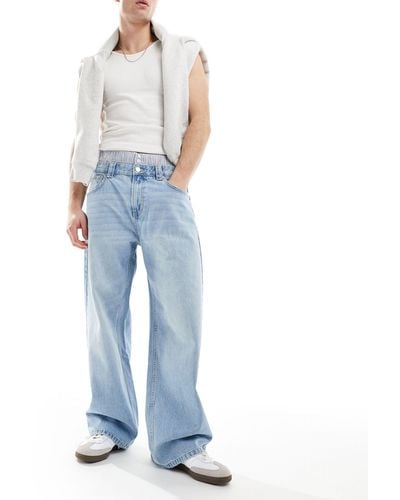 Bershka Jeans extra ampi con fascia - Blu