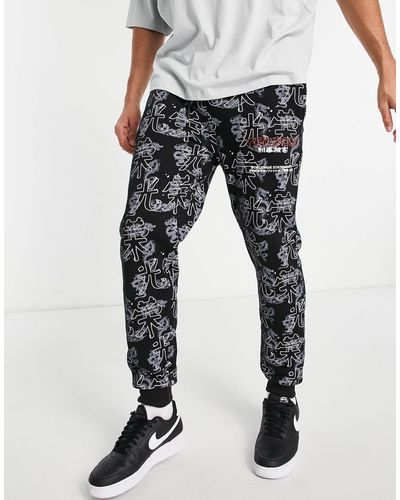 Criminal Damage joggingbroek Met Print - Zwart