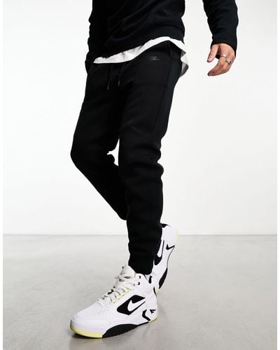 Nike Tech - pantalon - Noir