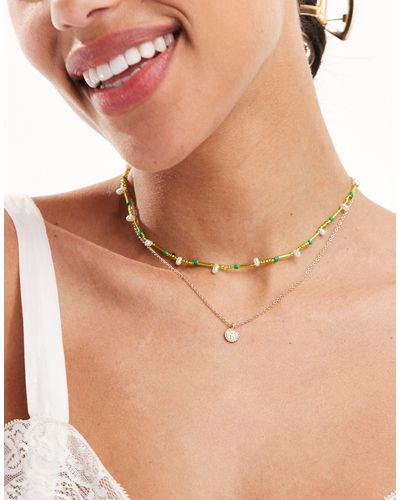 ASOS – 2er-pack halsketten mit grünem perlen- und scheibendesign - Braun