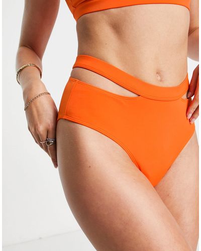 Monki Slip bikini arancioni con cut-out - Arancione